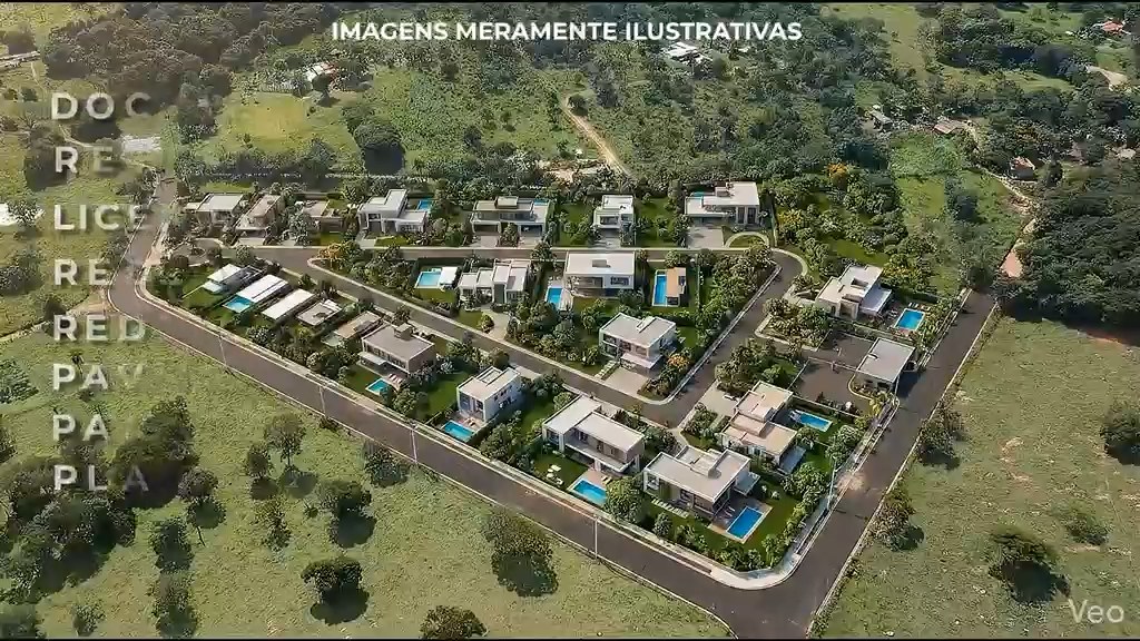 Projeção do condomínio pronto, com ruas, casas e piscinas